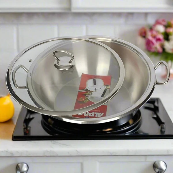 Alpha double bottom stainless steel karahi with glass lid on gas stove